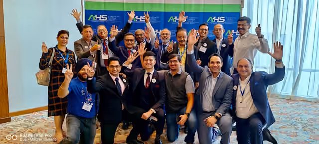 Surgeons collaborating at an AWR community event